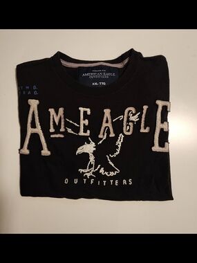 Vintage American Eagle Outfitters Black Tee with Cream Logo Appliqué